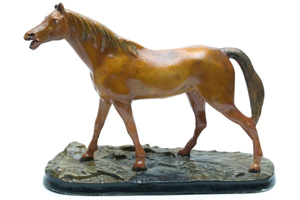 Brown plaster statuette of horse